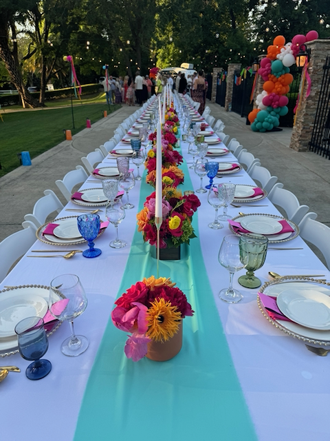 Sophisticated white florals with lush greenery in a classic vase